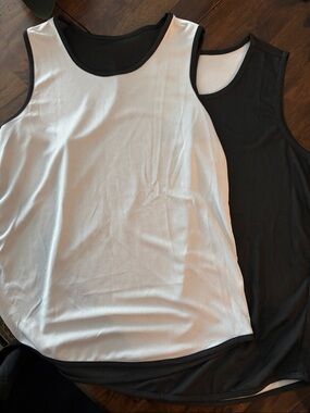 Set of TWO Reversible Black and White Mens basketball jerseys